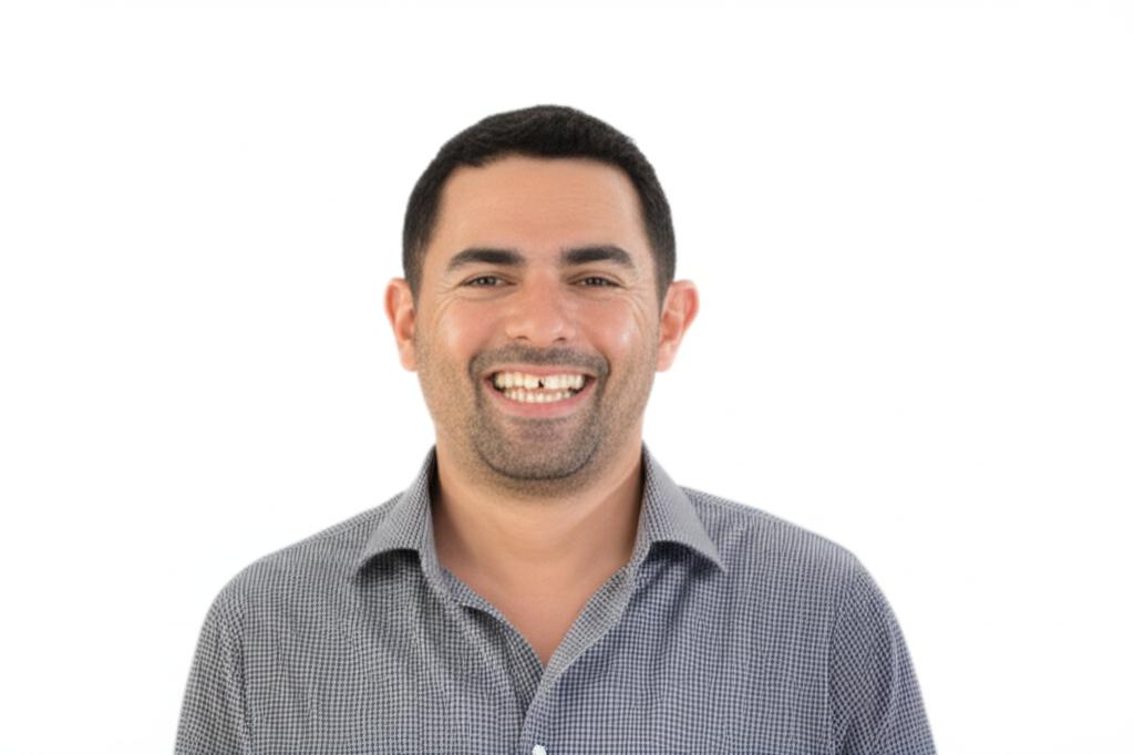 A middle-aged man smiling confidently, looking refreshed and energetic.